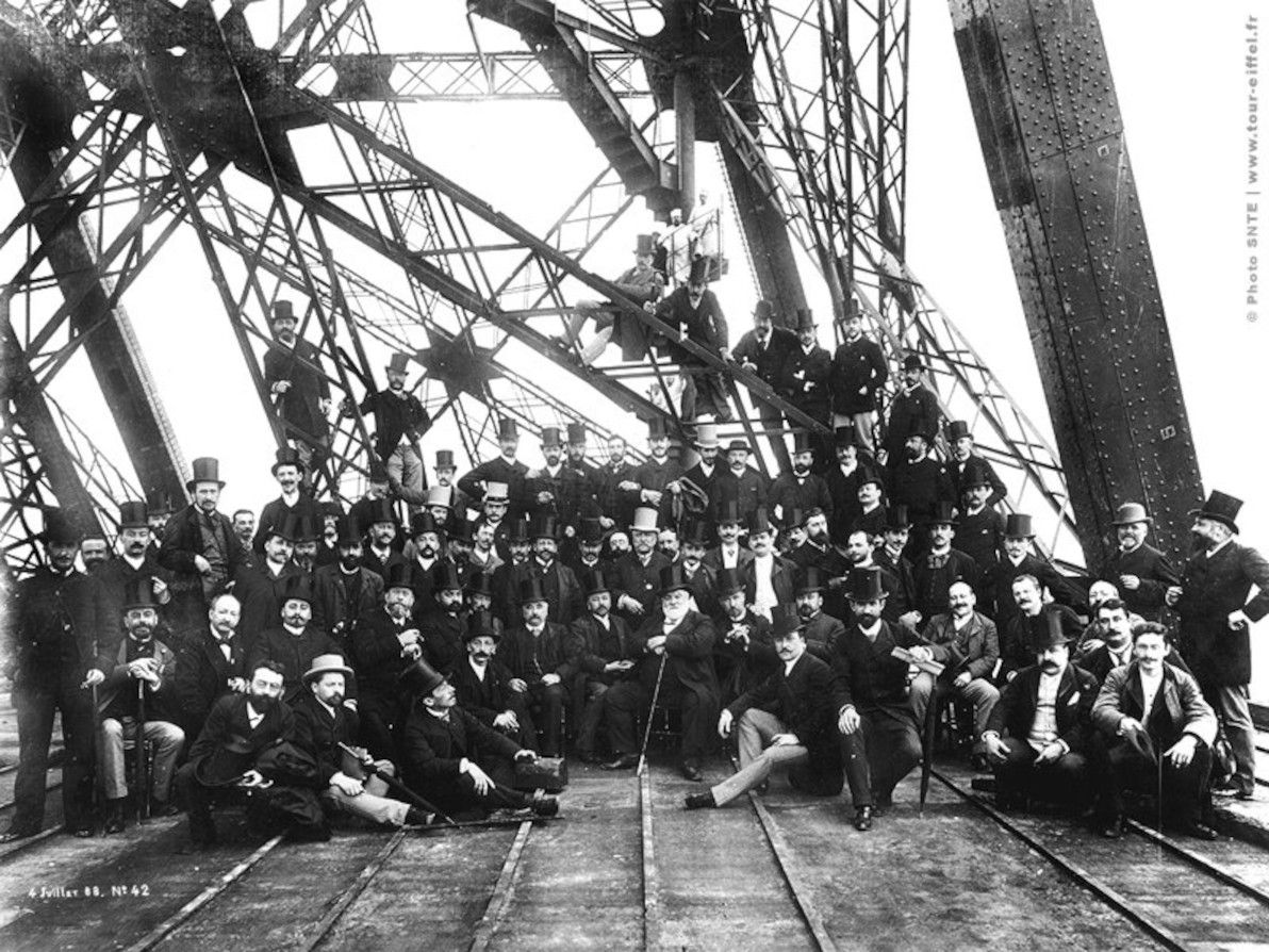 The big crew gathered at the base of the Tower, Jul 1888.