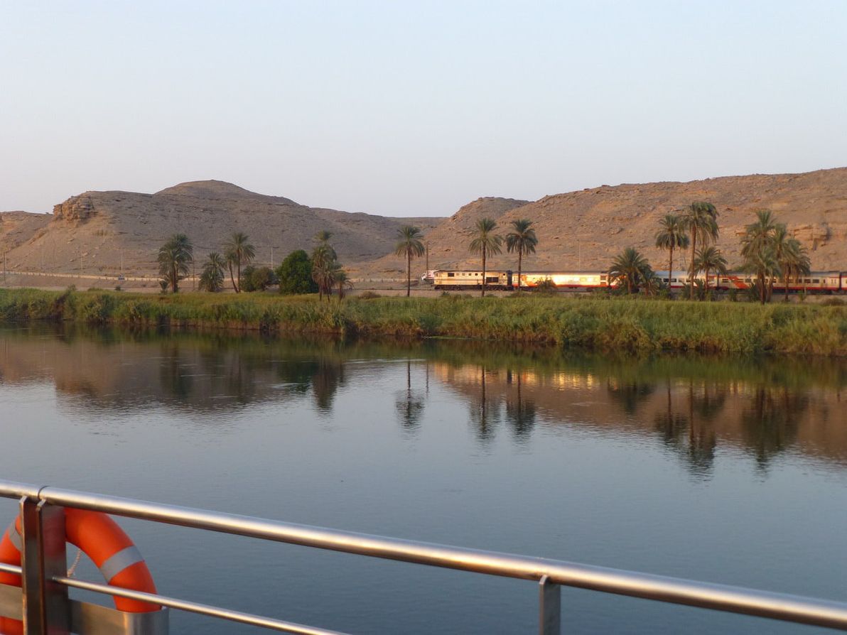 Train service running alongside the famous Nile River.