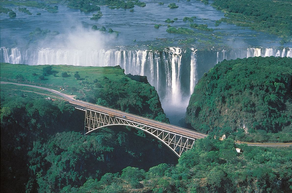 Victoria Falls Bridge: a marvel of modern engineering, straddles one of the world's natural wonders.